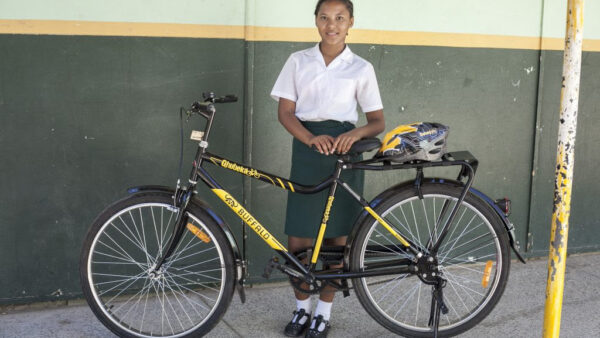 Team Dimension Data for Qhubeka meets Kylemore learners as they take ownership of their new bicycles